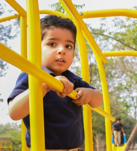 Pre-school child enjoying a playground activity at Nalanda School Vadodara