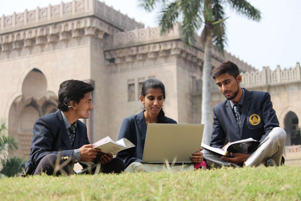 Students Studying and Discussing in Garden